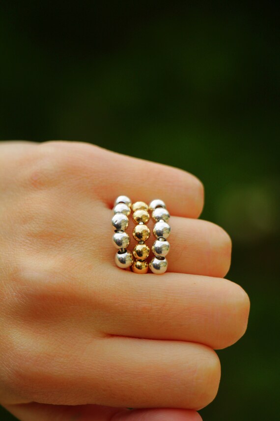 Ring with moving balls deals