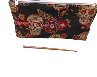 Large jacquard pencil case with Mexican skeleton patterns, lined and closed with a zip