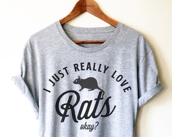 May include: Gray t-shirt with a black graphic of a rat and the text "I just really love rats okay?"