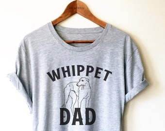 May include: A gray t-shirt with the text "Whippet Dad" and a black and white illustration of a whippet dog.