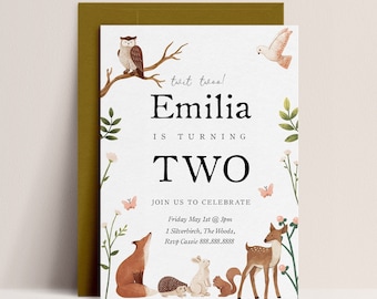 May include: A woodland-themed birthday invitation for a child turning two. The invitation features a whimsical illustration of animals, including an owl, a fox, a deer, a rabbit, a hedgehog, and a squirrel. The text on the invitation reads "twit twoo! Emilia is turning two. Join us to celebrate Friday May 1st @ 3pm 1 Silverbirch, The Woods, Rsvp Cassie 888.888.8888"