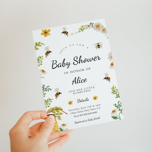 May include: A baby shower invitation with a bee and flower theme. The invitation is for Alice and her little bumblebee. The invitation includes the date, time, and location of the shower, as well as the RSVP information. The invitation is registered at Baby World.