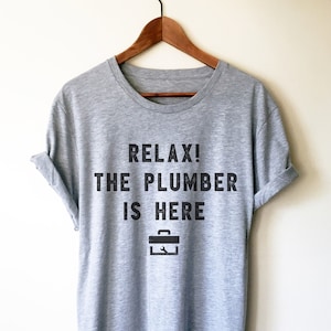 The Plumber Is Here Unisex Shirt - Plumber, Plumber T-Shirt, Plumbing Shirt, Plumber Gift, Fathers Day Gift, Gift For Dad