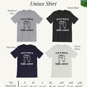 May include: Unisex t-shirt with a graphic of a shoulder joint and the text "Let's Rock This Joint". The shirt is available in four colors: heather grey, classic black, deep navy, and classic white. The shirt is available in sizes S-4XL with chest measurements ranging from 34-37 inches to 58-61 inches.