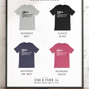 May include: Four t-shirts in different colors, each with the word "Libra" and a definition of the zodiac sign. The colors are heather grey, classic black, heather ink navy, and heather fuscia. The t-shirts are displayed on a white background with the text "Color Options" and "Stag & Peach Co. Original Goods Made to Last".
