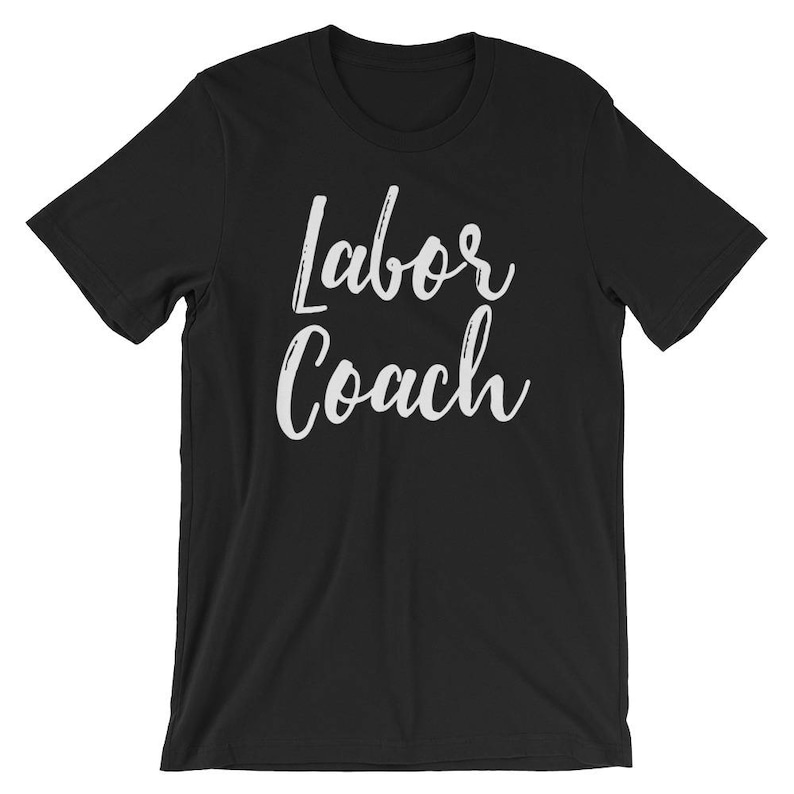 May include: Black short-sleeved t-shirt with white text that reads "Labor Coach" in a cursive font.