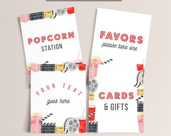 Puede incluir: Cuatro carteles imprimibles de 20,3 x 25,4 cm con temática de cine. Los carteles tienen rayas rojas y blancas, cubos de palomitas de maíz, carretes de película y porta-claquetas. El texto en los carteles dice "Popcorn Station", "Favors please take one", "Your text goes here" y "Cards & Gifts".