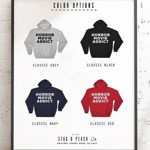 May include: Four different color options for a hoodie with the text "Horror Movie Addict" printed on the front. The colors are classic grey, classic black, classic navy, and classic red.