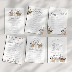 May include: A set of printable baby shower game cards featuring a cute cartoon dog theme. The cards include games like "Who's Who?", "Who's Memory?", "Guess Who's Baby Pic?", "A Lifetime of Wishes for Baby", and "How Big is Mommy's Bump?"