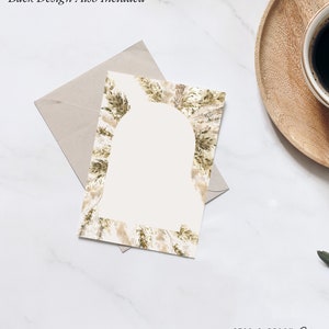 May include: A blank white card with a border of brown and beige watercolor leaves. The text "STAG & PEACH Co" is printed in black at the bottom of the card.