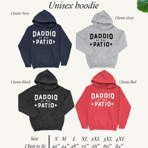 May include: Unisex hoodie in four colors: navy, grey, black, and red. The hoodie features the text "Daddio of the Patio" in white lettering on a black background. The hoodie is available in sizes S-4XL with chest measurements ranging from 40 inches to 64 inches.