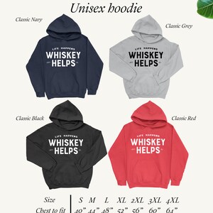 May include: Four unisex hoodies in navy, grey, black, and red. Each hoodie has a hood and a front pocket. The text "LIFE HAPPENS WHISKEY HELPS" is printed on the front. Sizes range from S to 4XL, with chest sizes from 40" to 64".