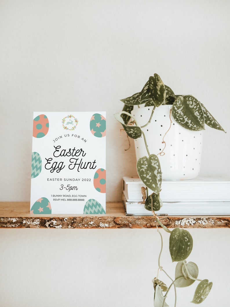 May include: A white card with a colorful Easter egg design. The card reads "Join us for an Easter Egg Hunt, Easter Sunday 2022, 3-5pm, 1 Bunny Road, Egg Town, RSVP Mel 888.888.8888".