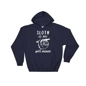 May include: A navy blue hooded sweatshirt with the text "Sloth -is my- spirit animal" in white. A cartoon sloth is hanging from a branch above the text.