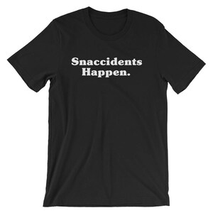 May include: Black t-shirt with white text that reads "Snaccidents Happen."