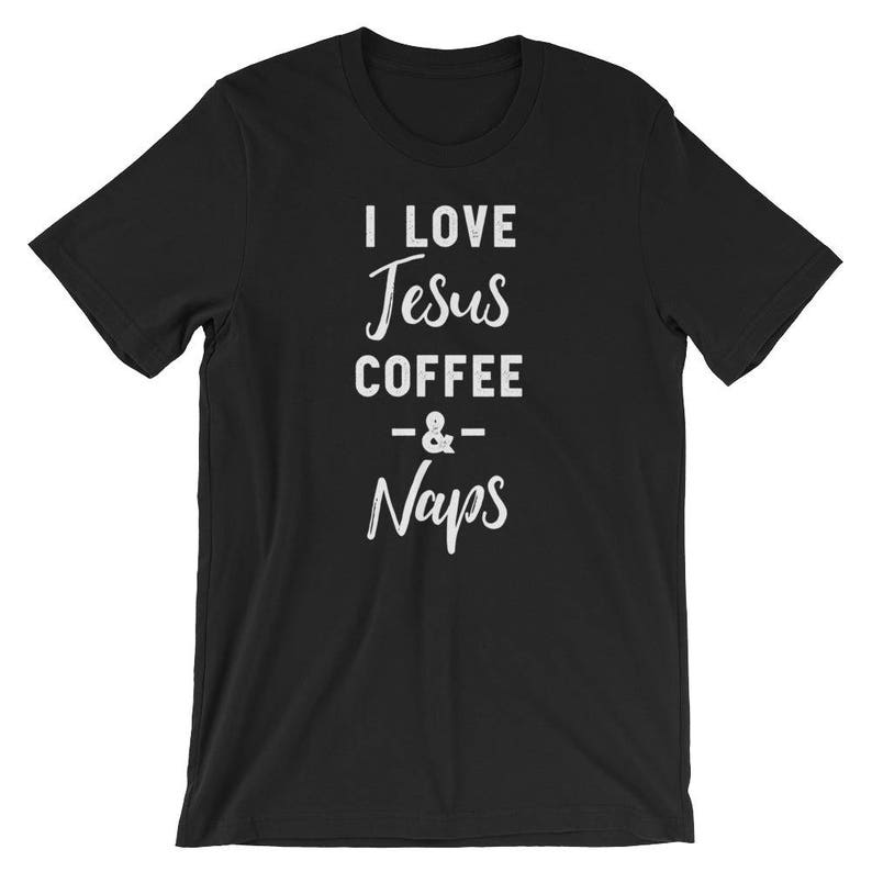 May include: Black t-shirt with white text that reads "I love Jesus Coffee & Naps".