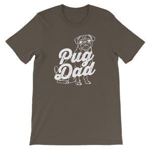 May include: A dark brown t-shirt with a white pug illustration and the text "Pug Dad" in a vintage style font.