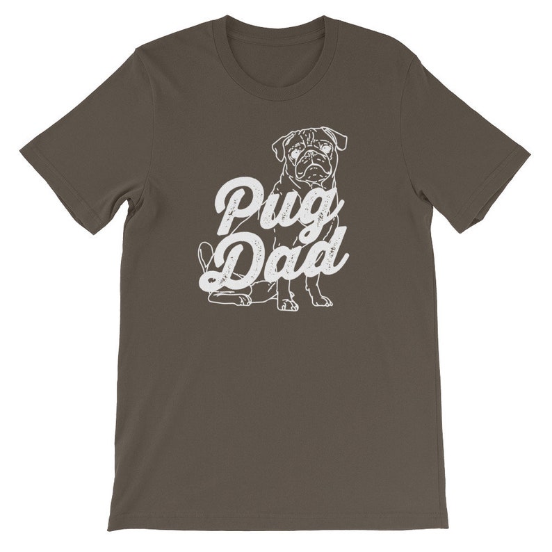 May include: A dark brown t-shirt with a white pug illustration and the text "Pug Dad" in a vintage style font.