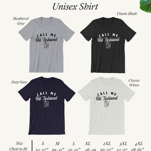 May include: Unisex t-shirt with the text "CALL ME Old Fashioned" and a graphic of an old fashioned cocktail. The shirt is available in four colors: heather grey, classic black, deep navy, and classic white. The size chart shows chest measurements in inches.