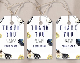 May include: White gift tags with a police theme. Each tag features the text "THANK YOU" in navy blue, along with a police badge, hat, and a police car with a dog. The text "FOR YOUR BACKUP FROM JASON" is also included.