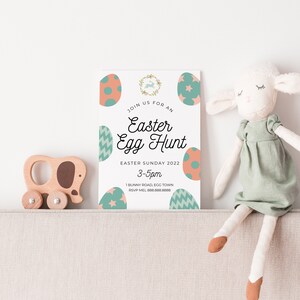 May include: An invitation to an Easter egg hunt with a pastel green and pink color scheme. The invitation features a bunny rabbit, eggs, and the text "Join us for an Easter Egg Hunt, Easter Sunday 2022, 3-5pm, 1 Bunny Road, Egg Town, RSVP Mel 888.888.8888".