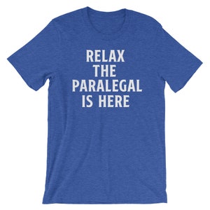 May include: A royal blue t-shirt with the text "Relax the Paralegal is Here" in white.