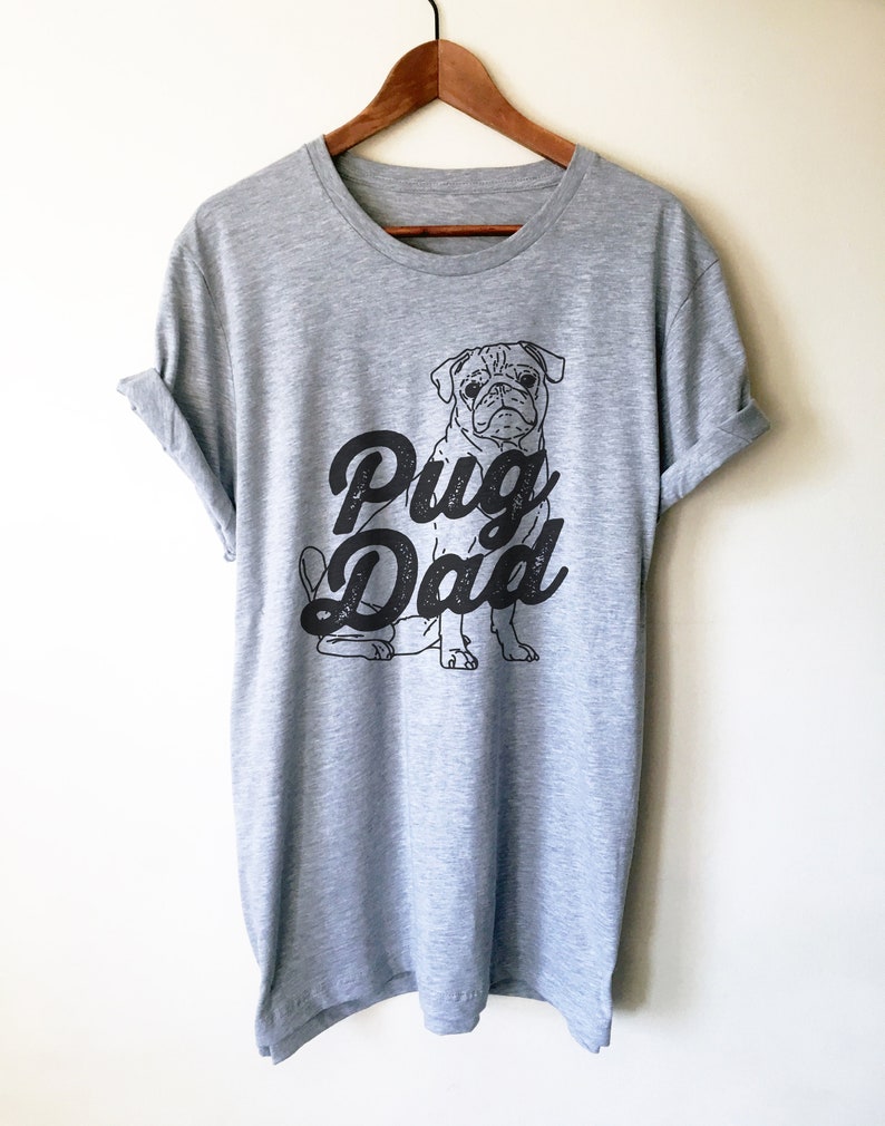 May include: Gray t-shirt with a black pug illustration and the text "Pug Dad" in a vintage-style font.