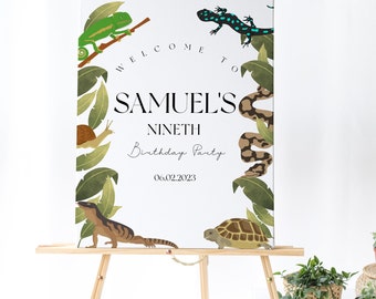 May include: Welcome to Samuel's Nineth Birthday Party, a white sign with green leaves and illustrations of a chameleon, lizard, snail, snake, iguana, and turtle.