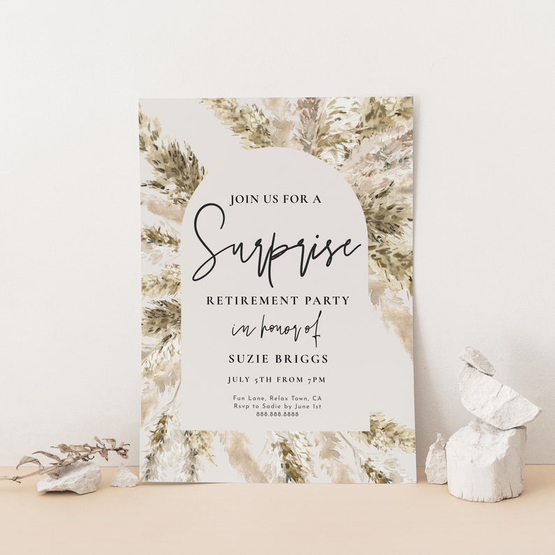 May include: A white invitation with a brown and beige watercolor background featuring a floral design. The text reads "Join us for a Surprise Retirement Party in honor of Suzie Briggs July 5th from 7PM Fun Lane, Relax Town, CA Rsvp to Sadie by June 1st 888.888.8884"