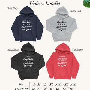 May include: Unisex hoodie in four colors: navy, grey, black, and red. The hoodie features a white graphic with the text "It's not dog hair, it's dachshund glitter". The size chart shows chest measurements in inches from 40 to 64 inches.