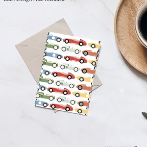 May include: A white card with a repeating pattern of colourful cartoon racing cars. The cars are red, blue, green, yellow, and grey. The text "Stag & Peach Co" is at the bottom of the card.