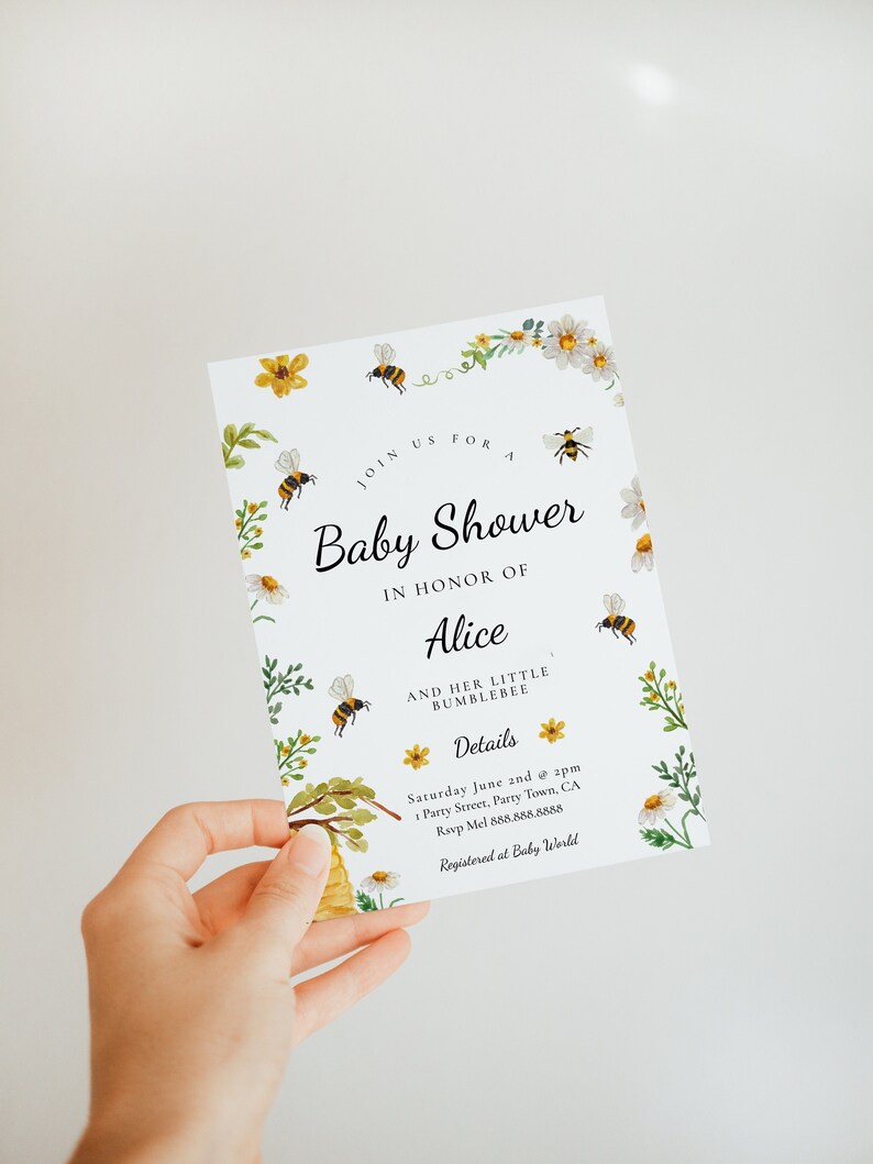 May include: A baby shower invitation with a bee and flower theme. The invitation is for Alice and her little bumblebee. The invitation includes the date, time, and location of the shower, as well as the RSVP information. The invitation is registered at Baby World.