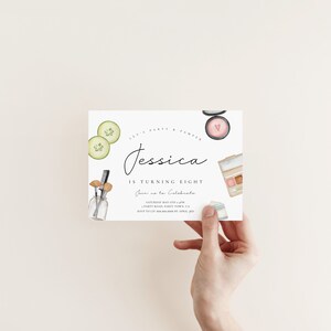 May include: A white invitation card with a watercolor illustration of makeup and beauty products. The text on the card reads "Let's Party & Pamper Jessica is turning eight. Join us to celebrate. Saturday May 4th 1-4 PM. Party Road Party Town, CA. RSVP to Liv 555-555-5555 by April 1st, 2023."