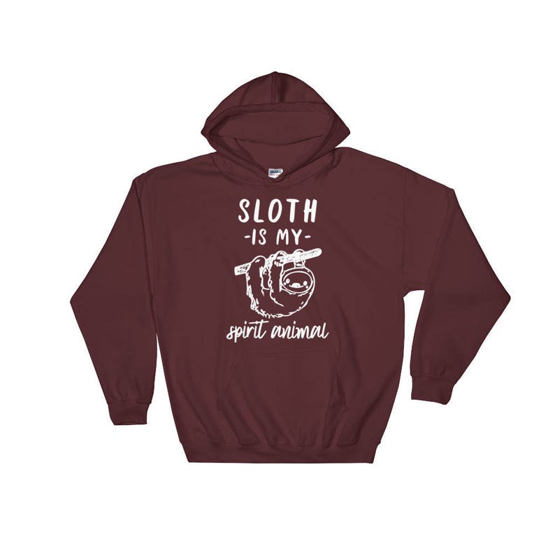May include: Burgundy hooded sweatshirt with white text that reads "Sloth -is my- spirit animal" and a graphic of a sloth hanging from a branch.