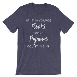 May include: A navy blue t-shirt with white text that reads "If it involves books and pajamas count me in".
