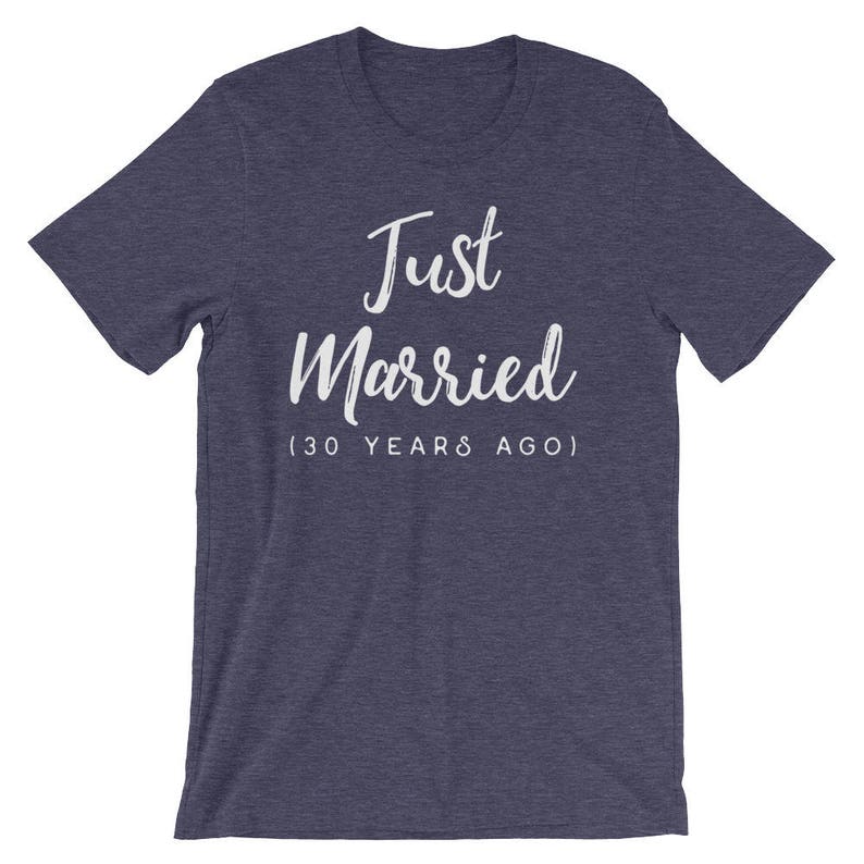 May include: A navy blue t-shirt with the text "Just Married (30 Years Ago)" in white.
