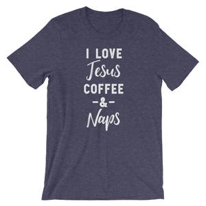 May include: A navy blue t-shirt with the text "I love Jesus Coffee & Naps" in white.