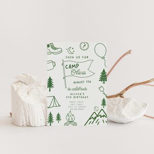 May include: A white invitation card with green illustrations and text. The card reads "Join us for Camp Olivia" with details for a 5th birthday celebration, including the date, location, and RSVP information. The design includes camping-themed icons.