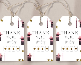 May include: Three white thank you tags with a magic hat and wand pattern. The text on the tags reads "Thank You from Lacy" with four gold playing card symbols below.