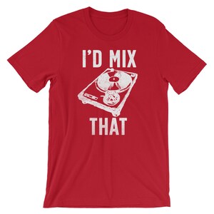 May include: Red t-shirt with a white graphic of a turntable and the text "I'D MIX THAT". The design is a distressed, vintage style. The shirt is made of a soft material.