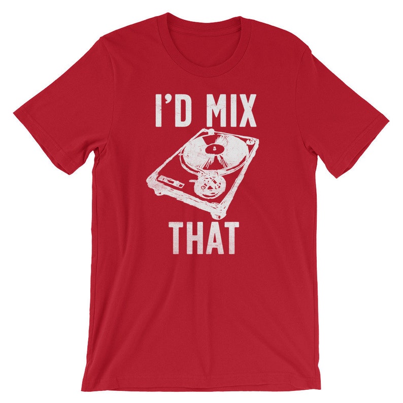 May include: Red t-shirt with a white graphic of a turntable and the text "I'D MIX THAT". The design is a distressed, vintage style. The shirt is made of a soft material.