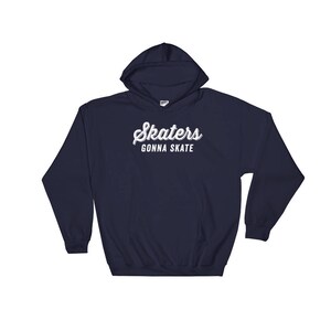 May include: Navy blue hooded sweatshirt with the text "Skaters Gonna Skate" in white.
