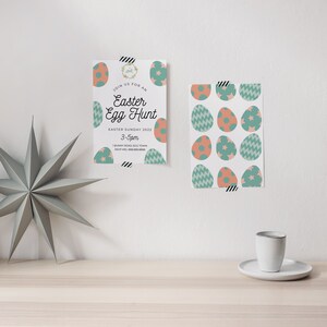 May include: A white invitation card with a green and pink Easter egg design. The text on the card reads "Join us for an Easter Egg Hunt, Easter Sunday 2022, 3-5pm, Bunny Road, Egg Town, RSVP Help 885.88."