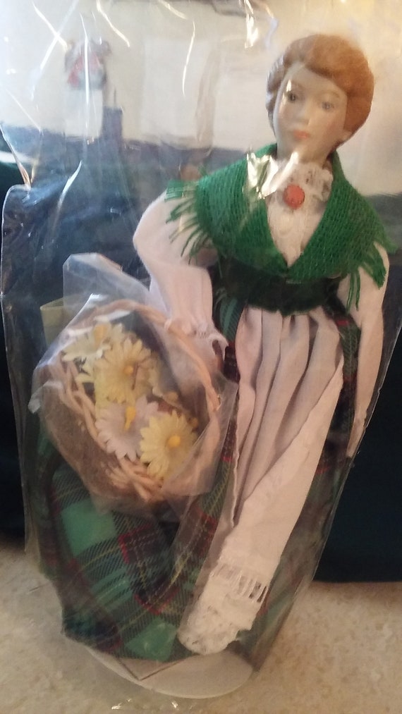 avon international porcelain doll collection