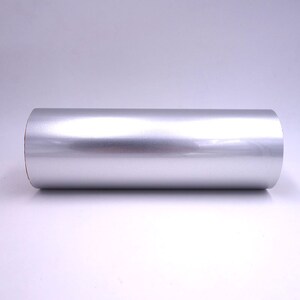 May include: A roll of silver vinyl wrap. The vinyl is smooth and shiny.