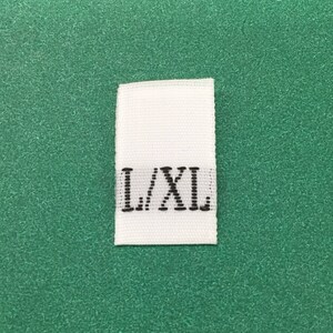 100 pieces of high quality white woven size tab &quot;L/XL&quot;