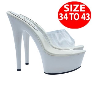 May include: White platform heels with a clear strap and a high stiletto heel. The shoes are available in sizes 34 to 43.