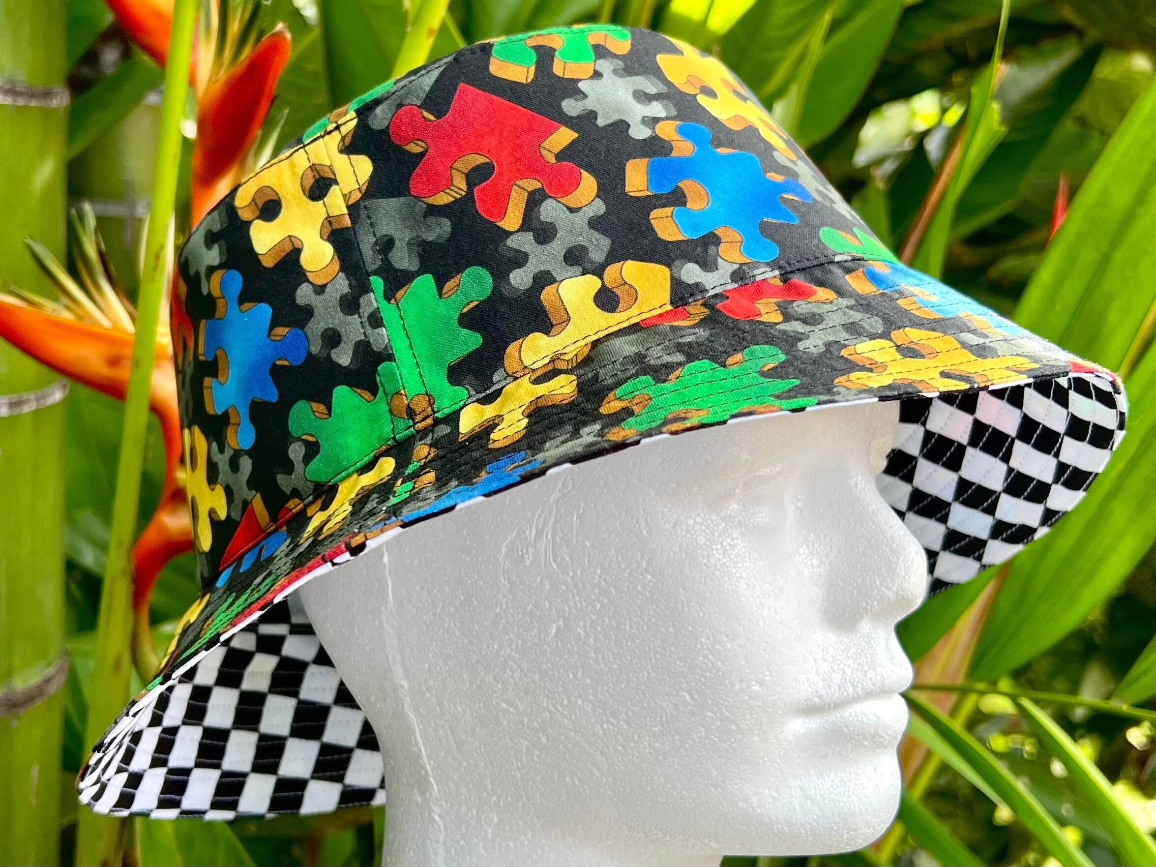 Bucket hat reversible all cotton hat. Puzzle Piece to black and white checker. Autism awareness and Puzzle gamer Choose Sizes xs to xl