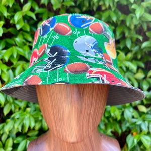 Football season theme Bucket Hat, Reversible to two sides, brim can be folded up for style. Medium