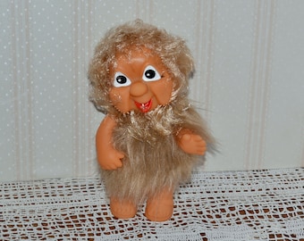 Rubber gnome with moving arms, in a fur coat, with hair Made by GDR Nostalgia GDR toy Decoration vintage doll New old stock